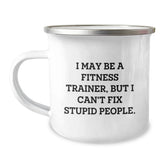Funny Fitness Trainer Gifts from Family for Him - 'I May Be A Fitness Trainer, But I Can't Fix Stupid People.' Camping Mug, Stainless Steel with Enamel Finish, Perfect for Christmas Unique Gifts - Image 1